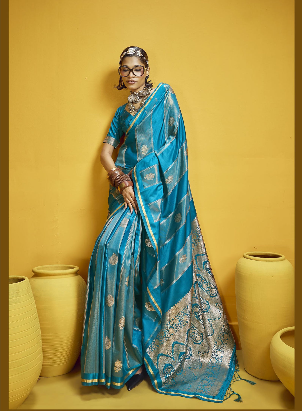 Sky blue silk saree with silver zari motifs and traditional pallu. Elegant Indian ethnic wear for weddings and festivals. Bollywood4u Australia.