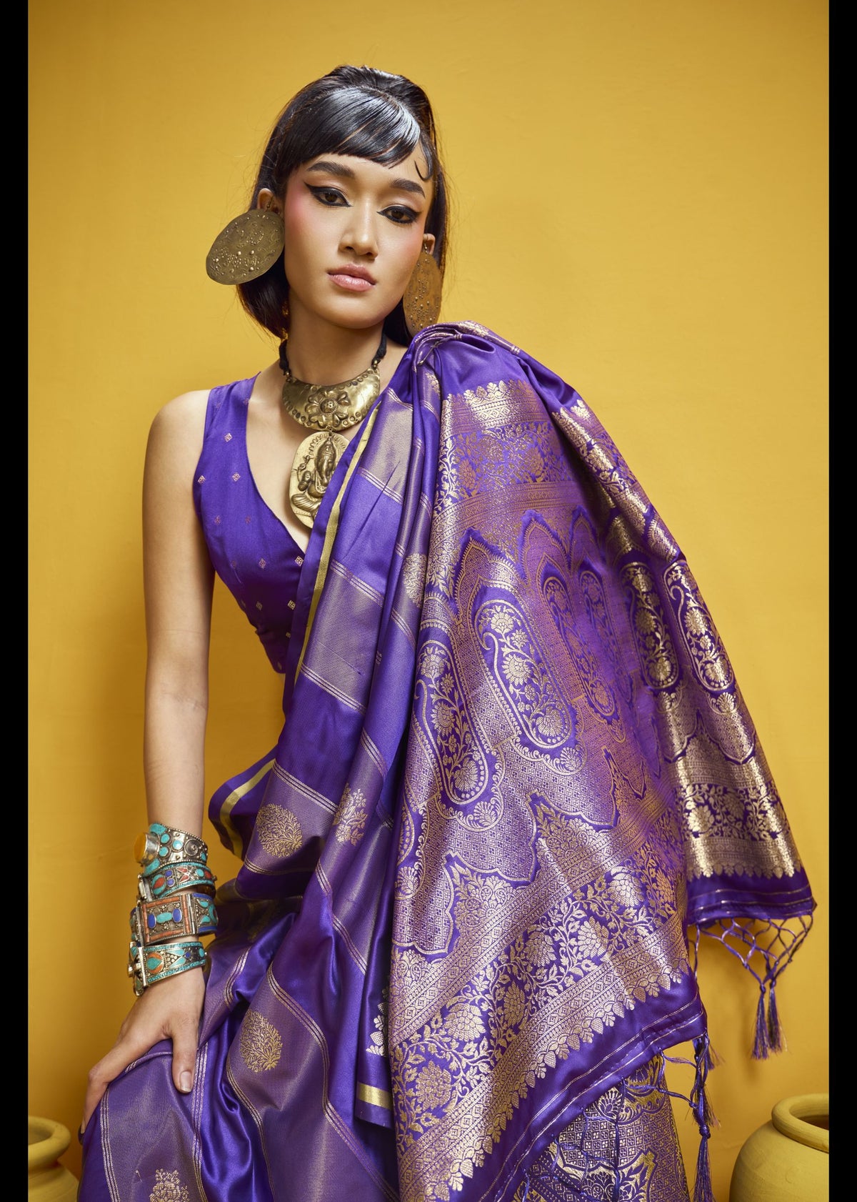 Royal purple silk saree with gold zari paisley pallu and floral butis. Perfect for weddings and grand celebrations. Bollywood4u Australia.