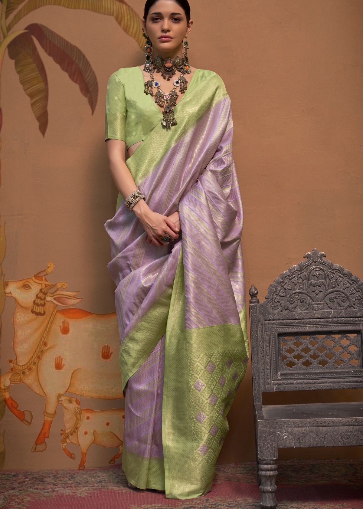 green and lavender silk saree with draped pallu 