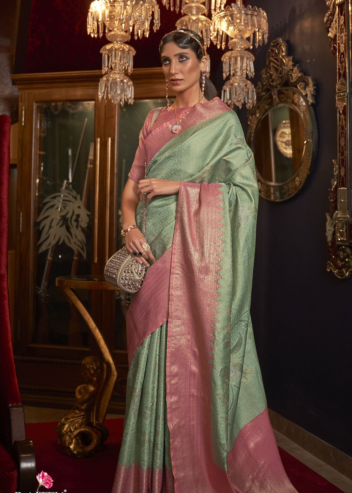 Soft shimmer silk saree in statement colours, crafted for cultural events, parties, and Bollywood‑inspired styling PINK AND MINT 