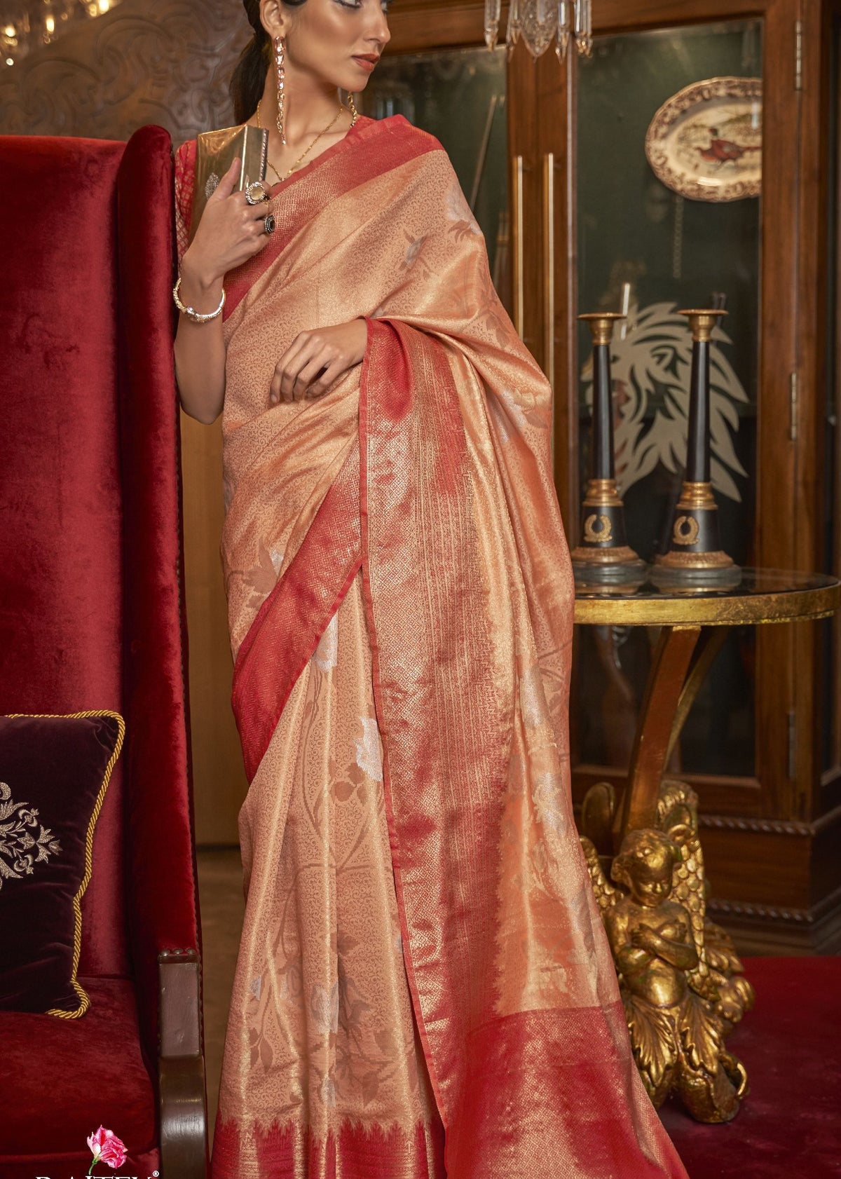 Designer shimmer silk saree in rich coloured tones, ideal for Bollywood‑style bridal wear and celebrations