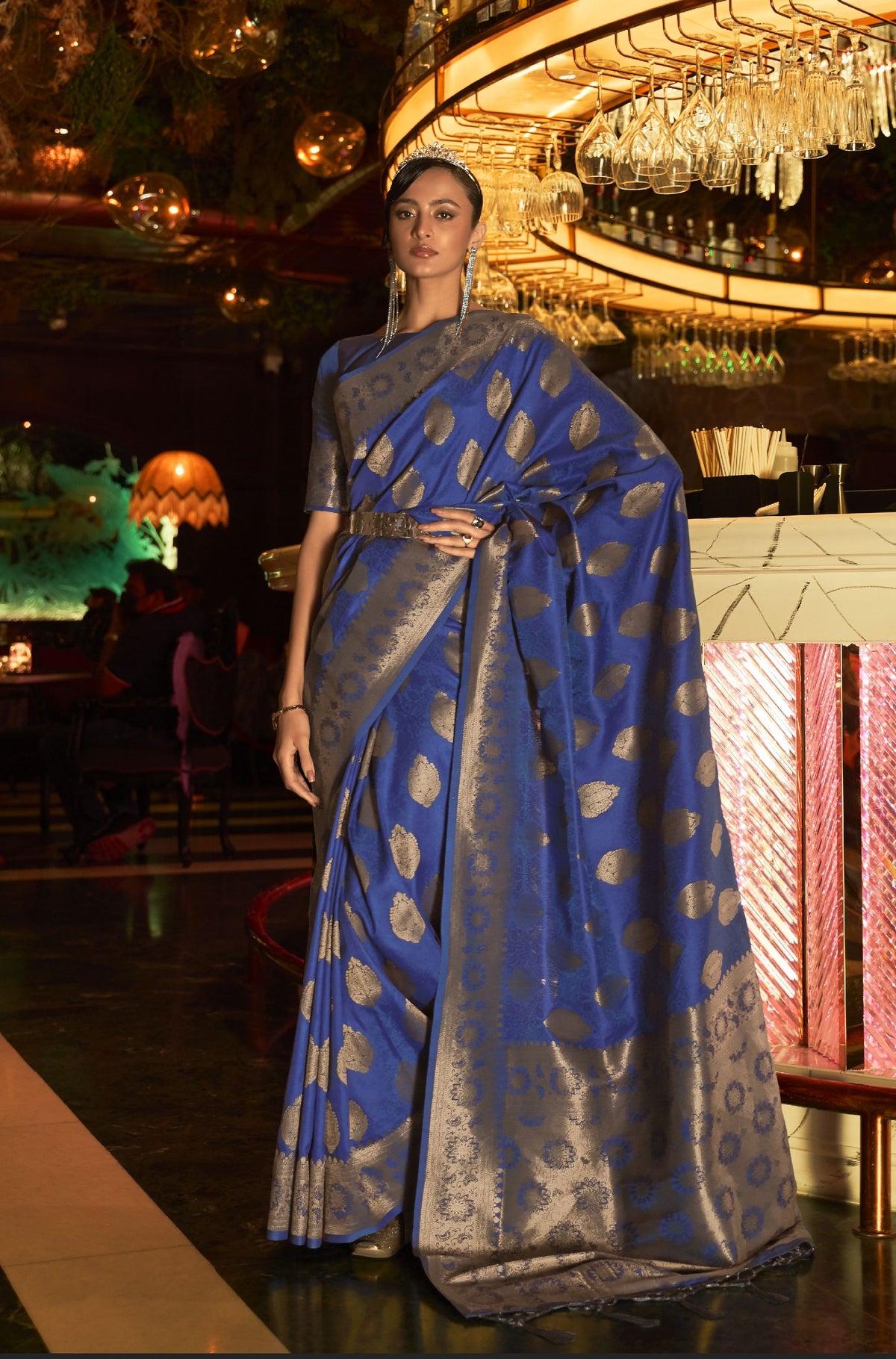 Blue silk saree with silver motifs—elegant festive drape for cocktail parties and upscale celebrations