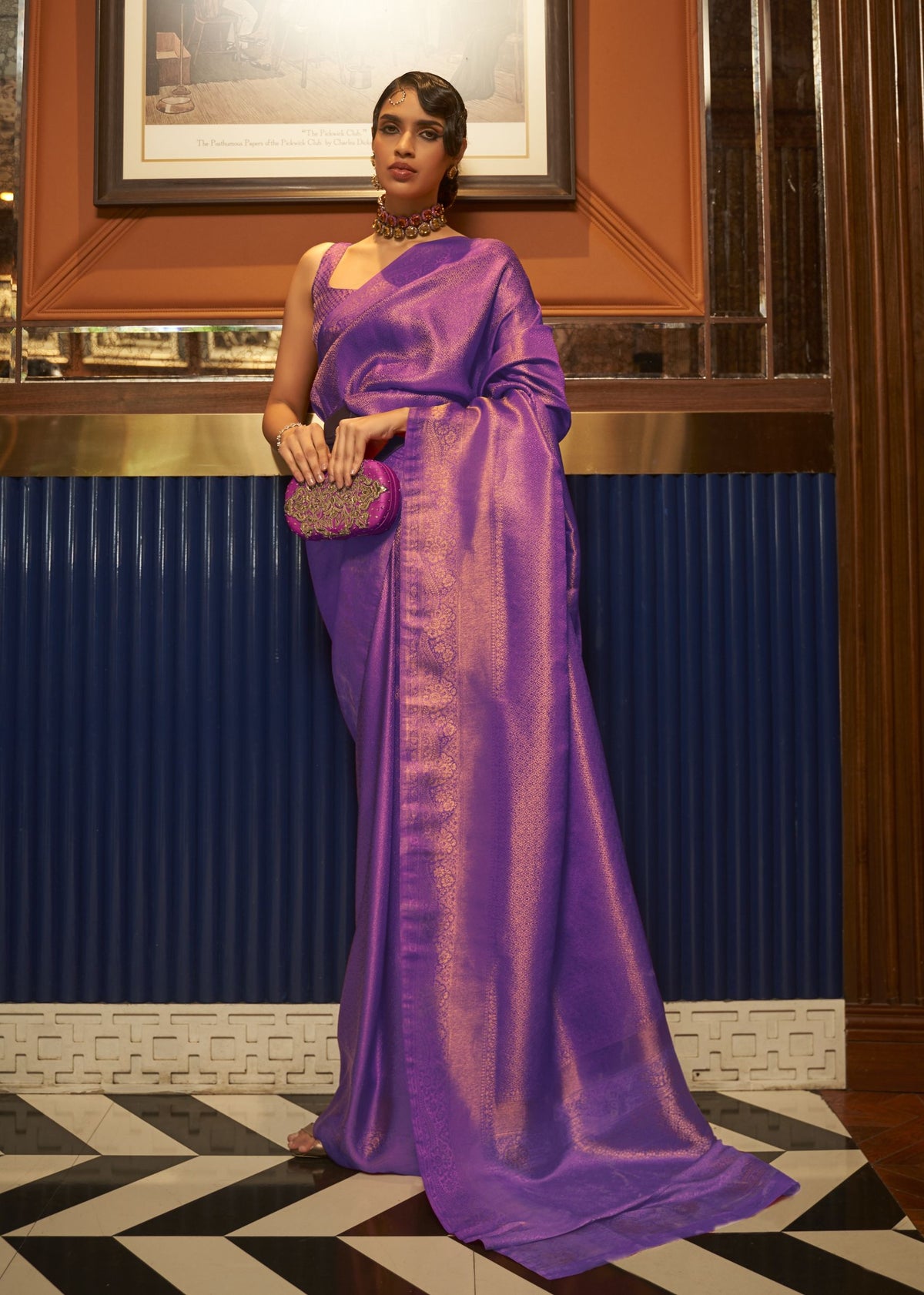 Purple nylon satin copper‑zari saree crafted with a deep satin glow and intricate copper‑zari work.