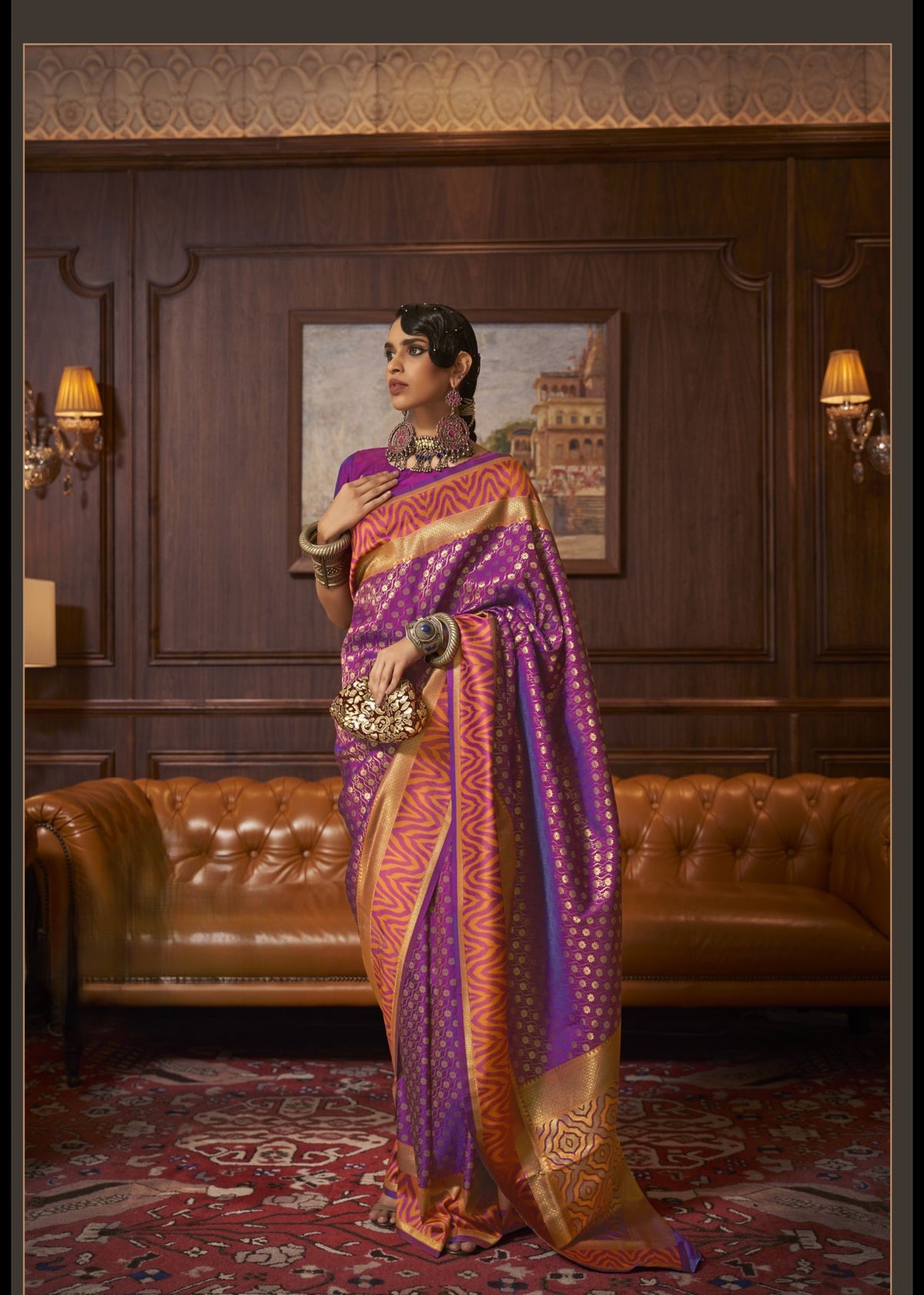 Purple Kazah Silk saree with gold polka dots, orange-gold zigzag border, and rich silk sheen — statement festive saree for premium occasions