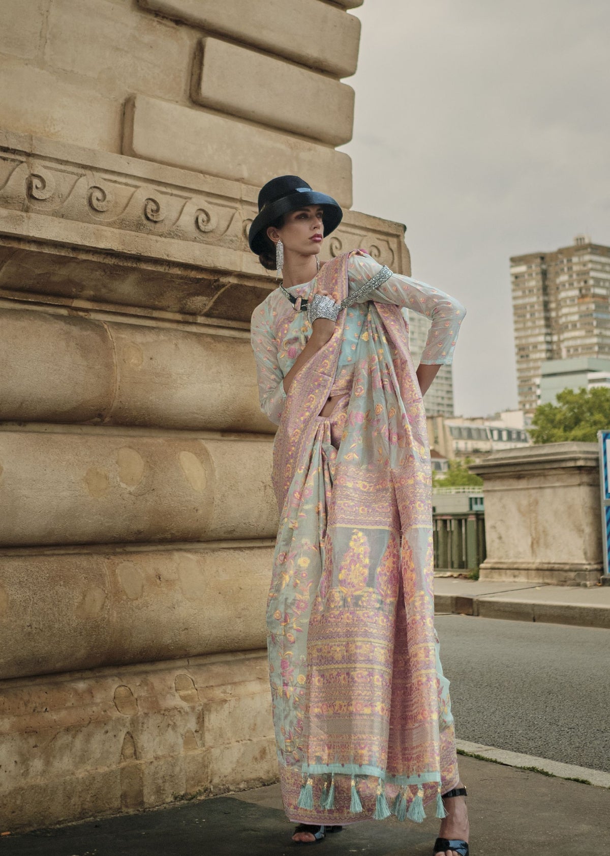 Cream Kashmiri organza handloom saree with intricate motifs for weddings, receptions, and Bollywood‑inspired traditional styling