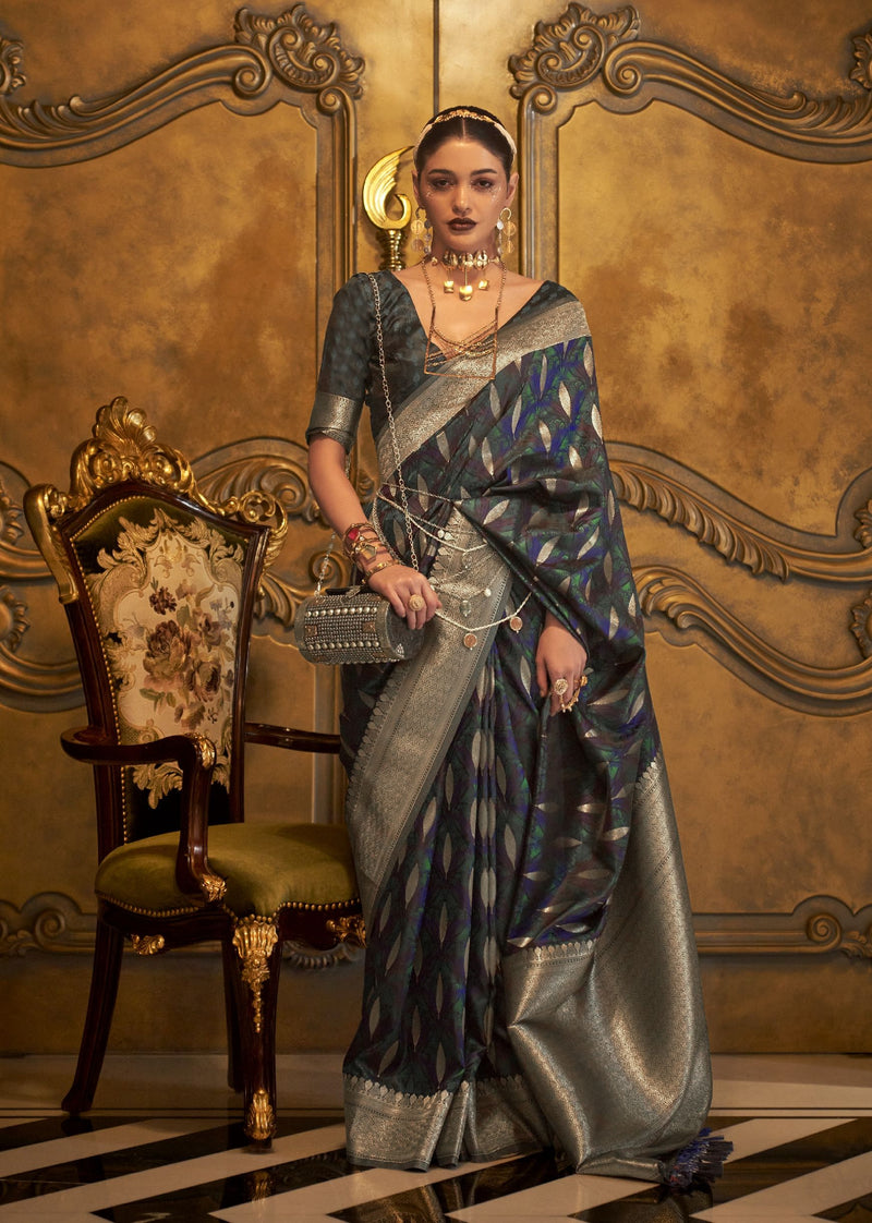 Designer satin saree with elegant detailing for bridal and celebration wear