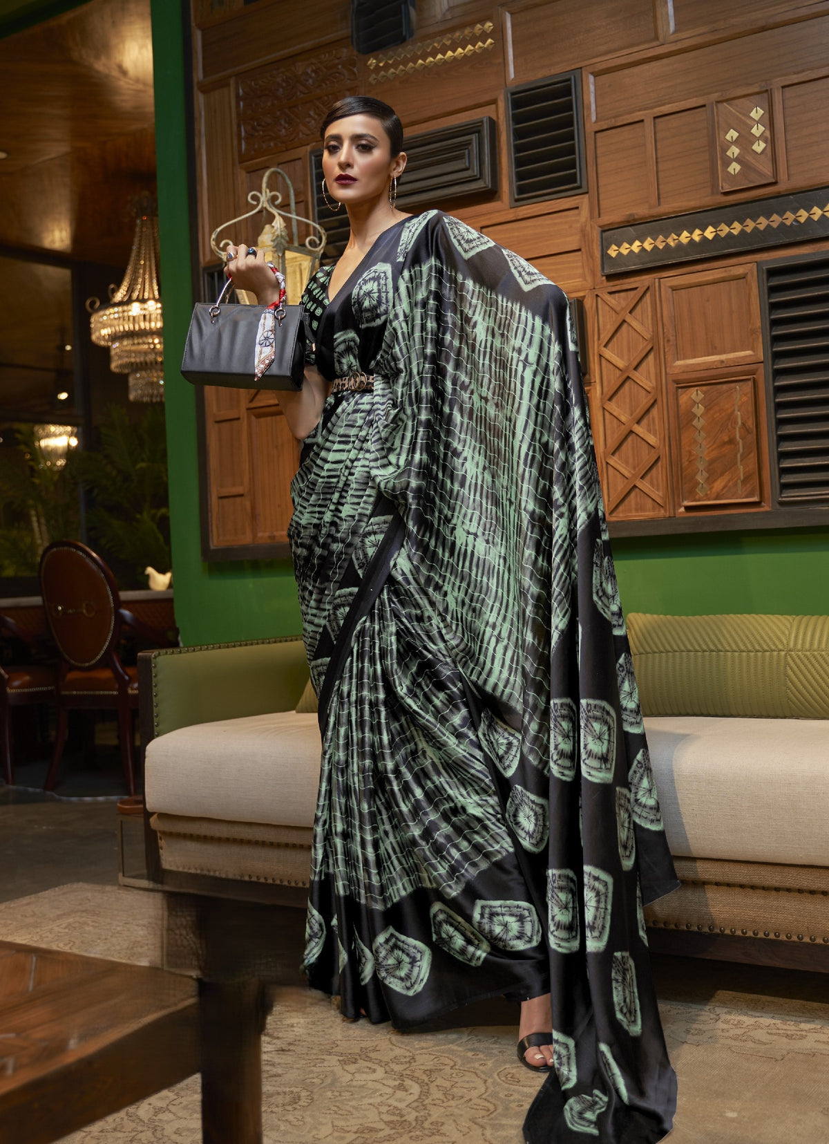 Black and mint green satin saree with geometric print border