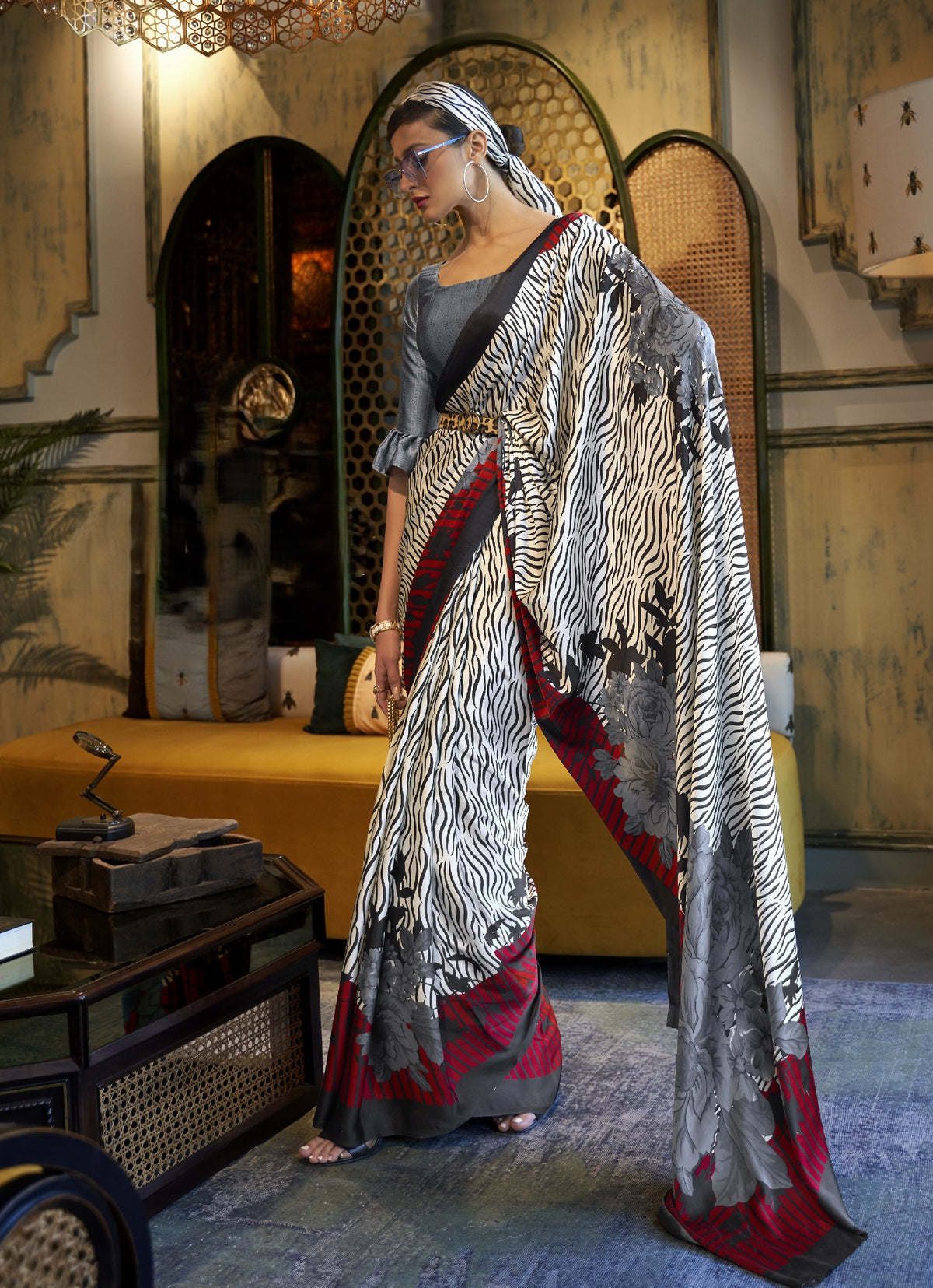 Grey and red zebra print saree with floral border - side drape view