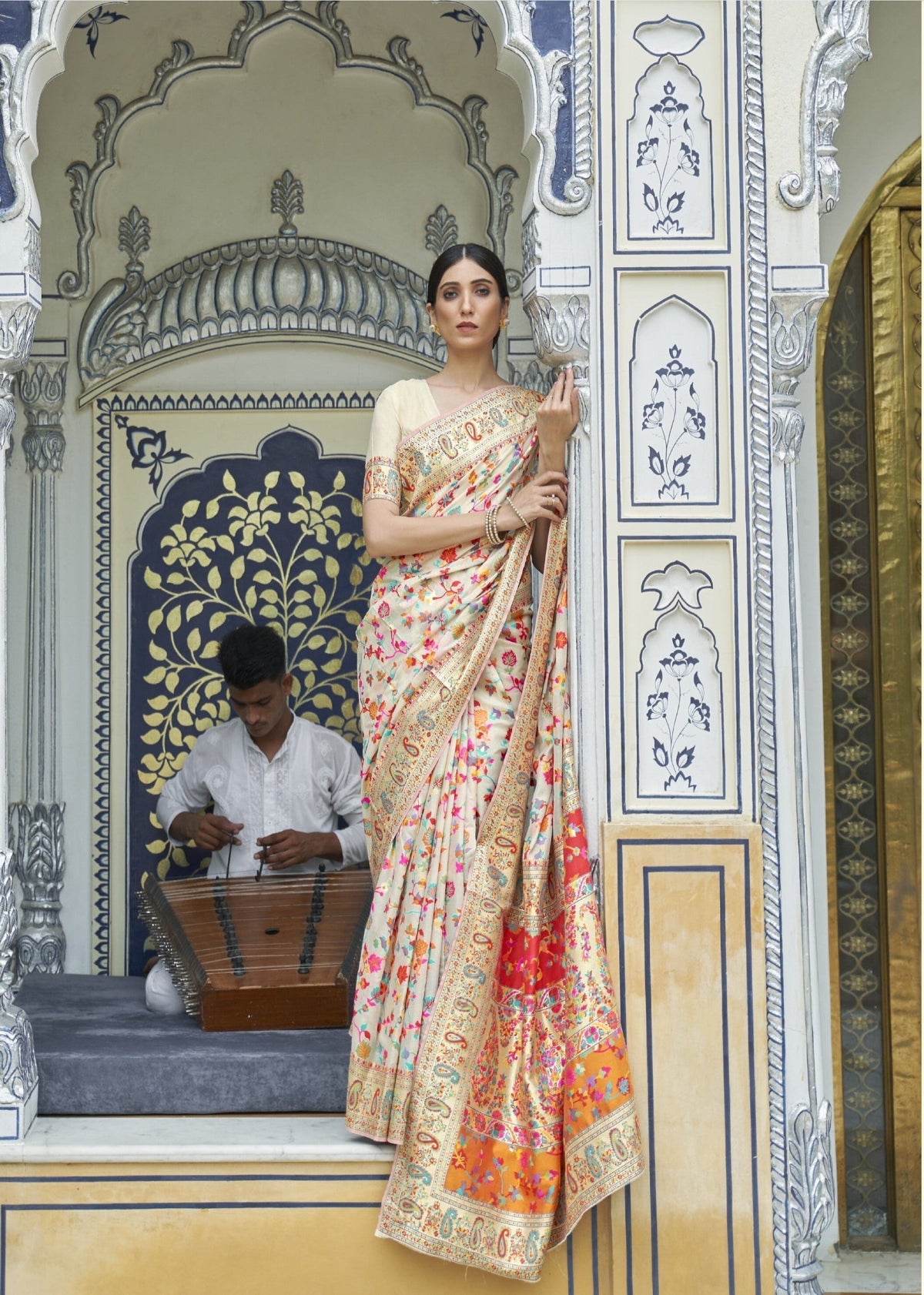 Cream silk saree with multicolor floral embroidery and gold zari border - bridal collection
