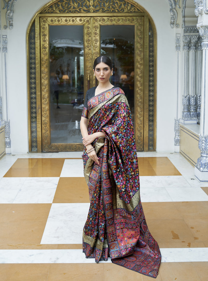 Black silk saree with multicolour Kashmiri floral embroidery and gold border